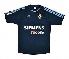As usual during the past few years, adidas will continue to design madrid's kits and training wear and while the first kit will be classic white and the third kit aquamarine, the away kit will be navy with gold trimming. Real Madrid Kit History Football Kit Archive