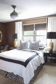 Design Dilemma Can I Put A Bed In Front Of A Window Schneiderman S The Blog Design And Decorating Eclectic Bedroom Living Room Blinds Bed Under Windows