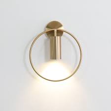 The dark bronze mixed with gold interior accents elevates this wall sconce from industrial to luxury. Modern Iron Wall Lamp Nordic Gold Wall Light Fixtures Home Decor Bedroom Bathroom Mirror Lights Indoor Lighting Decorati Wall Lamp Wall Lights Gold Wall Lights