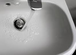 a bathroom sink drain with a snake