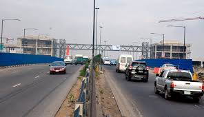 Oshodi, bolade very busy area trading,yellow bus on left and right,also the bridge flying over it. Lagos State Government Completes Skywalk Bridge In Oshodi Lagos Television Lagos News Politics Entertainment Events