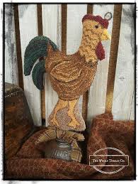 a punch needle pattern to create this happy rooster mounted