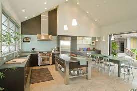 The angled ceiling lights affords you the opportunity to light up every inch of space in your kitchen. Lighting Solutions For Vaulted Ceilings 1000bulbs Com Blog Kitchen Ceiling Design Vaulted Ceiling Kitchen Kitchen Design