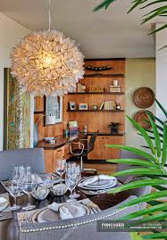 Small dining room sets fit perfect in apartments and dorms with limited space. Chandelier Over Luxury Dining Room Table In Highrise Apartment Plant Light Fixture Stock Photo 254644484