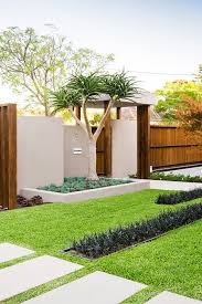 Warm Minimalist Landscape Design In Caulfield Modern Landscaping Minimalist Garden Modern Landscape Design