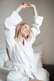 Do you wake up and stretch each morning before you start the day? Beautiful Blonde Woman Stretching Hands In The Morning Free Photo Nohat Free For Designer