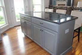 Island With Blue Pearl Granite Black Kitchen Countertops Grey Kitchen Cabinets Blue Countertops