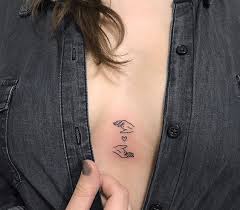 See more ideas about sternum tattoo, tattoo designs, tattoos. 44 Small Heart Tattoo In Between Breast