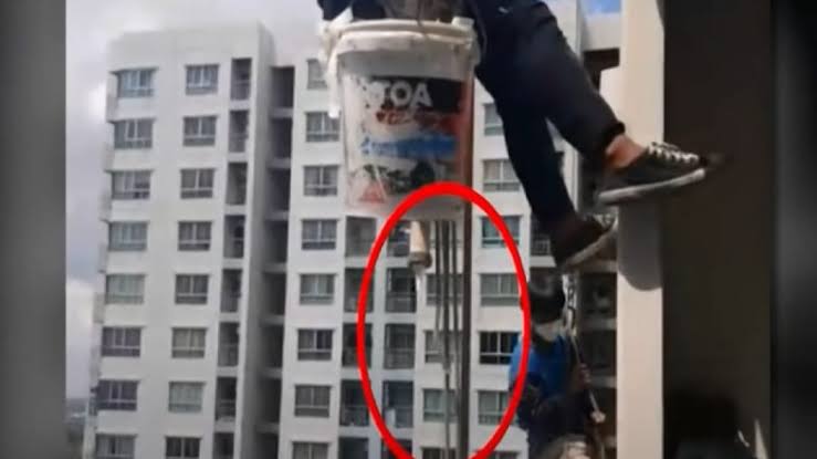 Woman cuts rope, leaves painters hanging from 26th floor of high-rise building in Thailand
