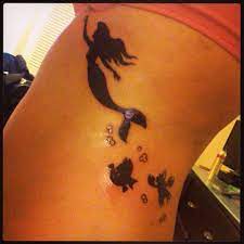 Check spelling or type a new query. My First Tattoo Little Mermaid Silhouette With Ariel Flounder And Sebastian Little Mermaid Silhouette Tattoos Silhouette Tattoos