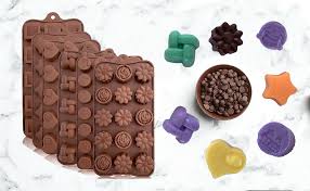This will make your finished truffles neater. Amazon Com Silicone Chocolate Candy Molds Silicone Baking Molds For Cake Brownie Topper Hard Soft Candies Gummy Jello Keto Fat Bombs Hearts Stars Flowers Emojis Fun Shapes In Brown Trays 6