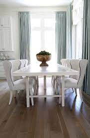 White lacquer contemporary 5pc dining set dining room furniture tight back chair. White Lacquered Dining Table With White Wingback Dining Chairs Transitional Dining Room