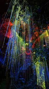 Neon led lights are draped and wrapped at the branches and trunks of trees. Avatar Secret Garden Penang Malaysia Imgur