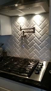 Back Splash White Beveled Subway Tiles In Chevron Pattern With Pot Filler In Me White Beveled Subway Tile Beveled Subway Tile Backsplash Beveled Subway Tile
