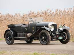 Rm Sotheby S Conversiveis Passaros Coloridos Veiculos