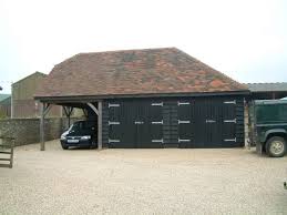 A carport is convenient when it's raining or you want to unload groceries easily. Timber Garages Ascot Timber Buildings