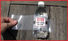 Then peel off the backing from your adhesive paper. Tutorial Cheaply Waterproof Your Water Bottle Labels Bottle Labels Diy Diy Water Bottle Labels Diy Water Bottle