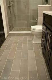 If your bathroom is a color, then a grey floor will be a neutral to pair it with. 230 Bathroom Tiles Ideas Small Bathroom Bathrooms Remodel Bathroom Design