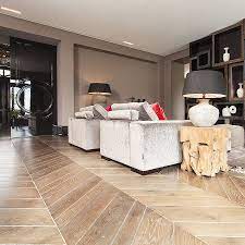 Parquet flooring can be laid on almost any surface from concrete to plywood. Large Chevron Flooring High End Handcrafted Floors Ebony Co