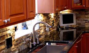 Reviewing engineered stone alongside natural stone and porcelain panels products makes its natural stone benchtops can add a strong sense of authenticity to a kitchen, with different stones. Natural Stone Kitchen Stacked Stone Veneer Kitchen