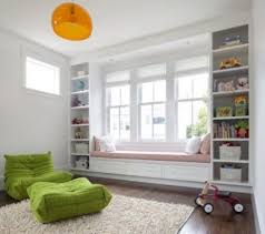 15 Cool Window Seats For A Kids Room Kidsomania Window Seat Design Window Seat Storage Built In Bookcase