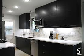 Black And White Quartz Countertops Modern Kitchen Black Cabinets White Quartz Counters Stainless Steel Range Hood Grey Limestone Backs Modern Black Kitchen White Quartz Countertop Black Cabinets
