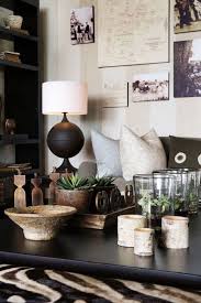 The african inspired home decorating style makes use of animal and tribal patterns to come up with a stylish, warm, and inviting. How To Create African Safari Home Decor With Images African Decor Living Room African Interior Design African Living Rooms