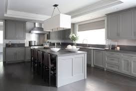 Even though the dominant color theme is off white in this design the natural wood floor makes an outstanding contrasting element that brings the place together. Related Image Grey Wood Floors Kitchen Grey Kitchens