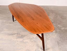 This diyer focuses on this idea by using stencils to paint the phrase life begins after coffee on the side of the table facing you. Free Form Shaped Kidney Coffee Table Designed By Svante Skogh Hpvintage Com