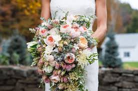 This free diy video will demonstrate how to make a cascading floral wedding bridal bouquet with mini calla lilies, roses, and dendrobium orchids. A Lush Cascading Bridal Bouquet Chic Vintage Brides