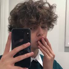 If you sleep with your hair in a lot of really tiny braids and take them out in the morning, your hair should be poofy and fluffy. Fluffy Alt Boy Haircut Novocom Top