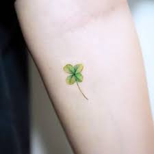 Four leaf clover tattoo on a wrist black and grey little. Wh0pcoyf1hj28m
