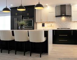 Black Base Cabinets And White Upper Cabinets Paired With Quartz Counters Villagehomestores C White Modern Kitchen Kitchen Design Transitional Kitchen Design