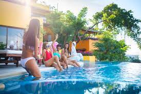 The uganda museum has go to bukoto at the 400 bar on thursdays watch comedy hosted by alex muhangi,then.on.sundays you have cayenne bar and the mighty sky lounge. Four Young Women Having Fun At The Poolside Abaf02143 Andre Babiak Westend61