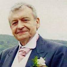 August: Chris Holmes