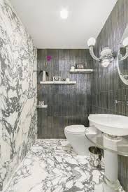 Artistic Tile Michael Aram Gotham Steel Walls With Arabescato Corchia Italian Marble Floor And Wal Italian Marble Flooring Green Marble Bathroom Marble Floor