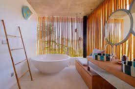 We ran this cool gray vinyl wallcovering horizontal, not the typically vertical application, to give. 15 Jaw Dropping Bathrooms In Bali You Must See Vilondo