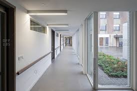 Paul goldberger on architecture, cities, and the brief called for a new modern work environment to house axel springer's growing business and the structure consists of open office spaces looking out onto several private interior courtyards and. Building Interior Corridor Stock Photos Offset