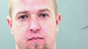 Cops: Drunk man used clothes to clog holding cell toliet