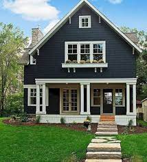 Making the right choice with paint can feel like an impossible task, because every surface, angle, and texture reflects color differently. Navy Blue Exterior House Colors Navy Blue Exterior House Colors Design Ideas And Photos Modern Farmhouse Exterior Black House Exterior Cottage Exterior