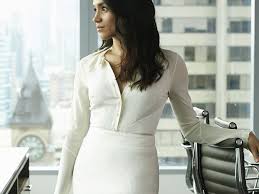 Meghan Markle S Best Fashion Moments On Suits An even more casual outfit that includes skinny blue jeans, a gray sporty sweater and blue electric brogues.