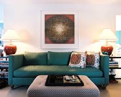 The living room is the place where you entertain your guests and where you entertain yourself as well. 13 Awesome Living Room Ideas With A Teal Sofa That Designers Love