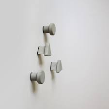 Circular And Triangular Concrete Wall Hooks Concrete Wall Wall Hooks Contemporary Wall Hooks