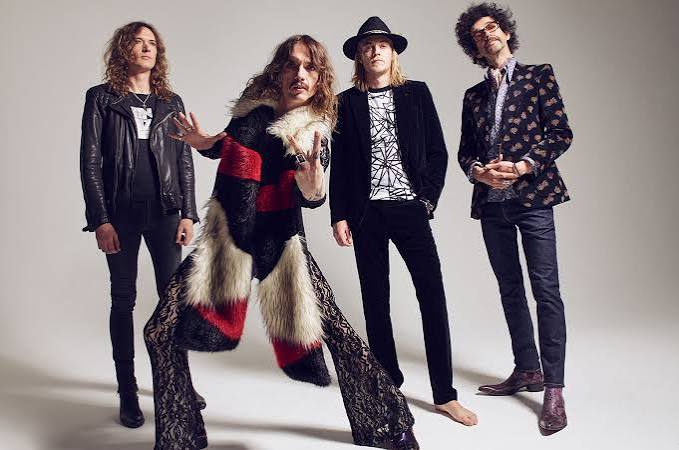 The Darkness Imagine an Alternate Universe on 'Easter Is Cancelled' Album |  Billboard