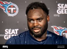 Tennessee Titans offensive lineman Nicholas Petit-Frere (78) stretches  during an NFL football training camp practice Saturday, Aug. 3, 2024, in  Nashville, Tenn. (AP Photo/Mark Zaleski Stock Photo