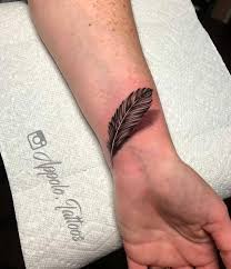 Realistic 3d Feather Tattoo W Drop Shadow By Nick Appolo Out Of Wilkes Barre Pennsylvania 570 Tattooing Co Tattoo Feather Tattoo Feather Tattoos Tattoos