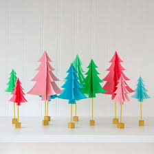 Decorate Your Home With Colorful Paper Christmas Trees This Holiday Season Full Tutorial Available Paper Christmas Tree Paper Crafts Diy Paper Crafts