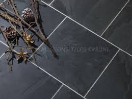 Lonsdale grey honed slate tiles are calibrated to 10mm so are easier to lay than other slates of varying thickness. Slate Riven Calibrated Brazilian Black 400x600x10mm Tiles R Us