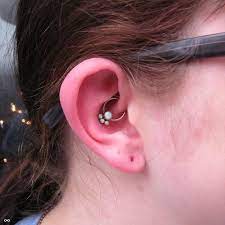 here s a nice daith piercing kali did with a anatometal white opal cluster cute daith piercing infection infected ear piercing daith ear piercing