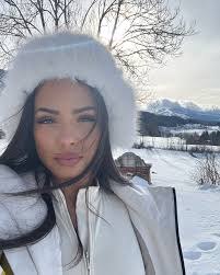 Christina Milian added a new photo — in...